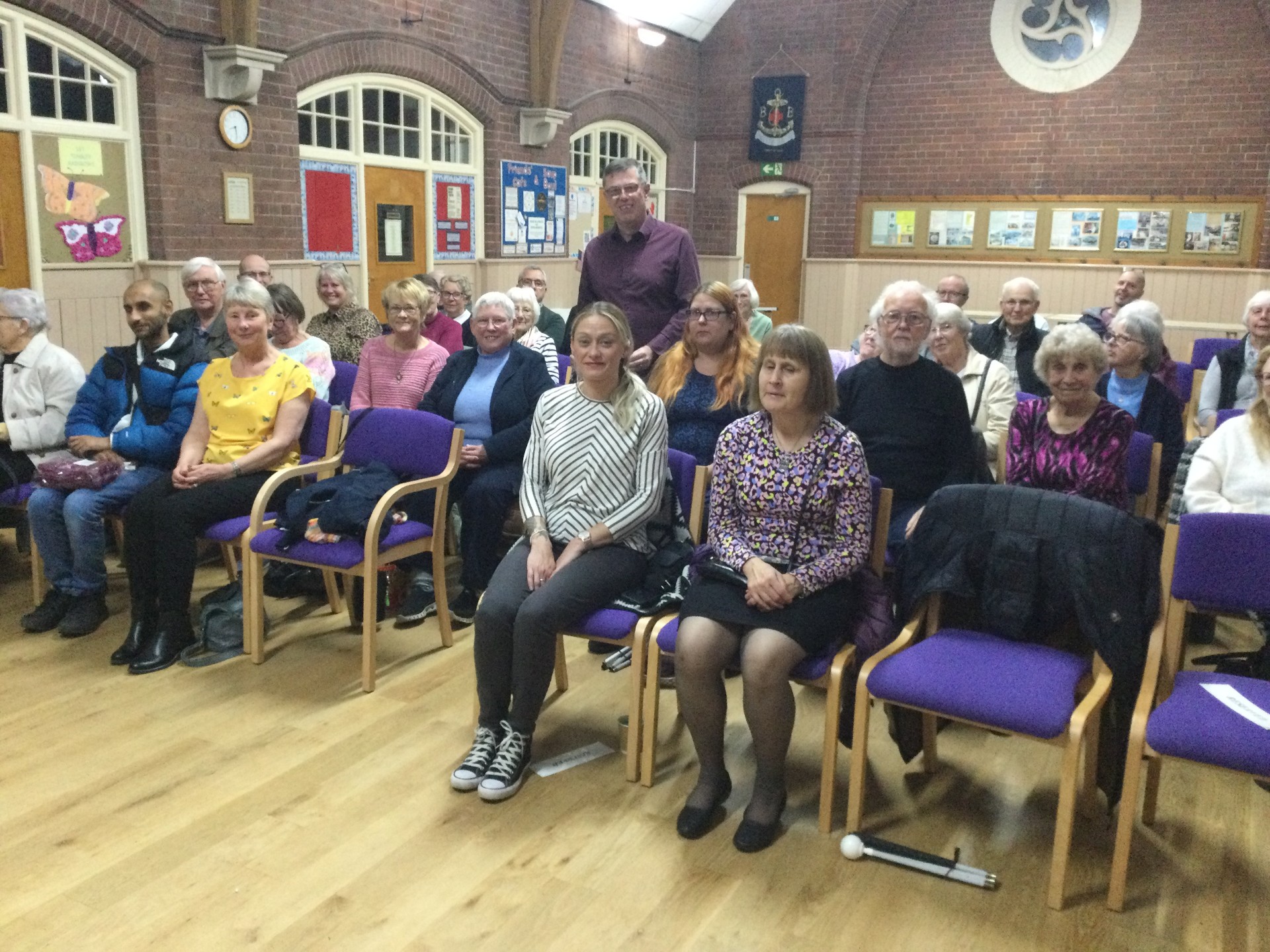 Image of congregation and members of Outlookers at event